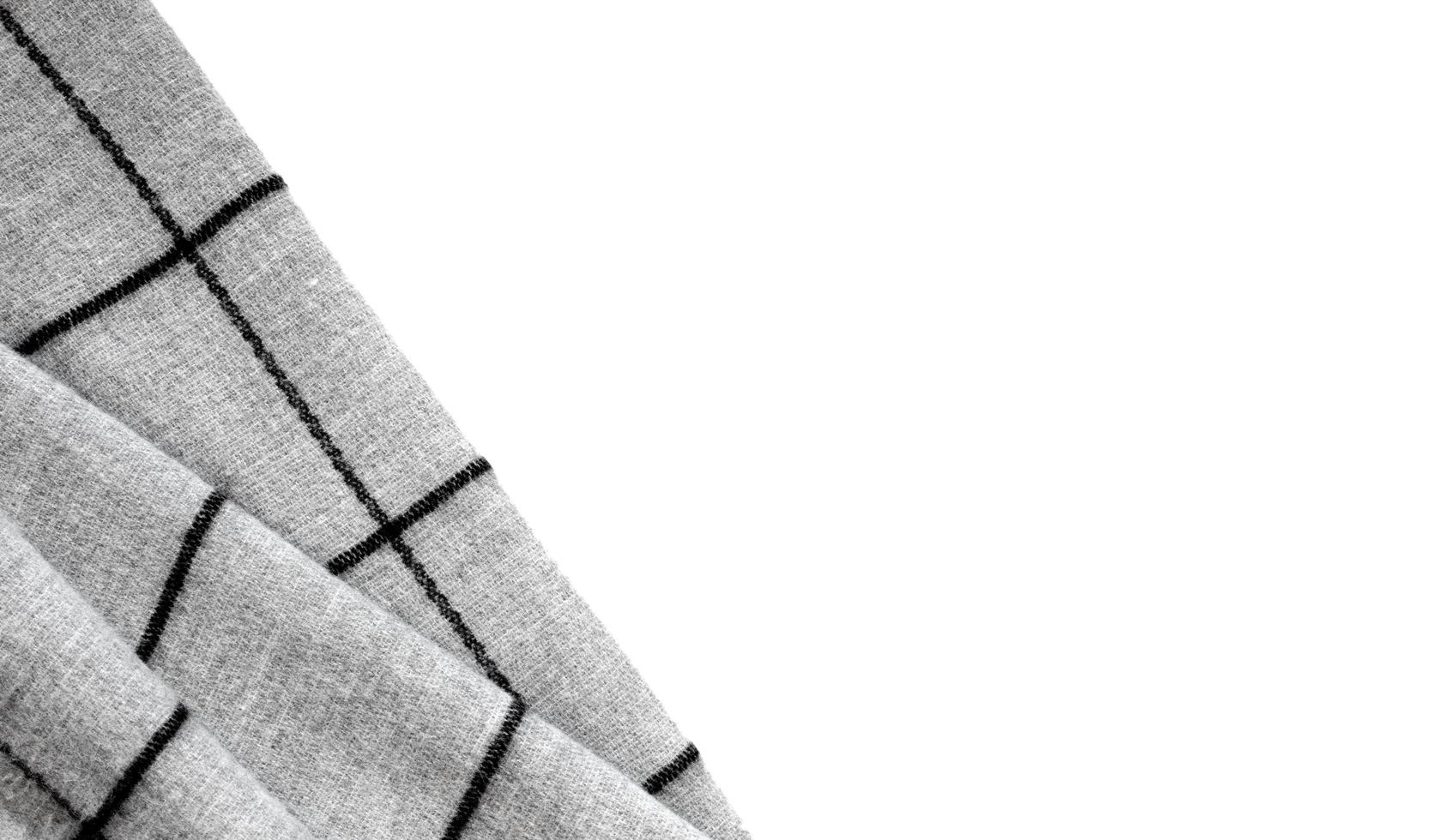 Top view of crumpled textured gray fabric on a white background with an area for text photo