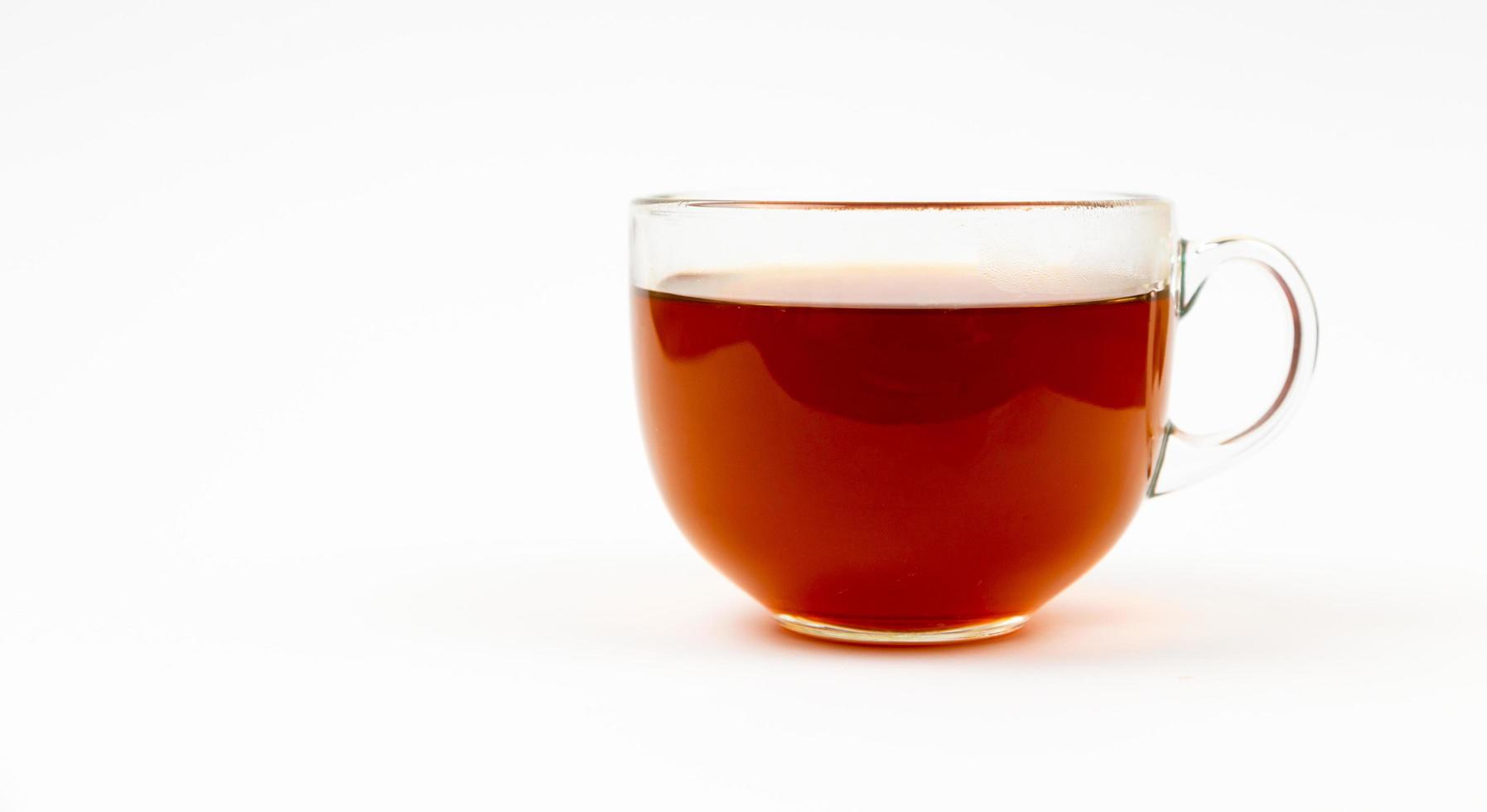 Glass cup of black tea Isolated on white background photo