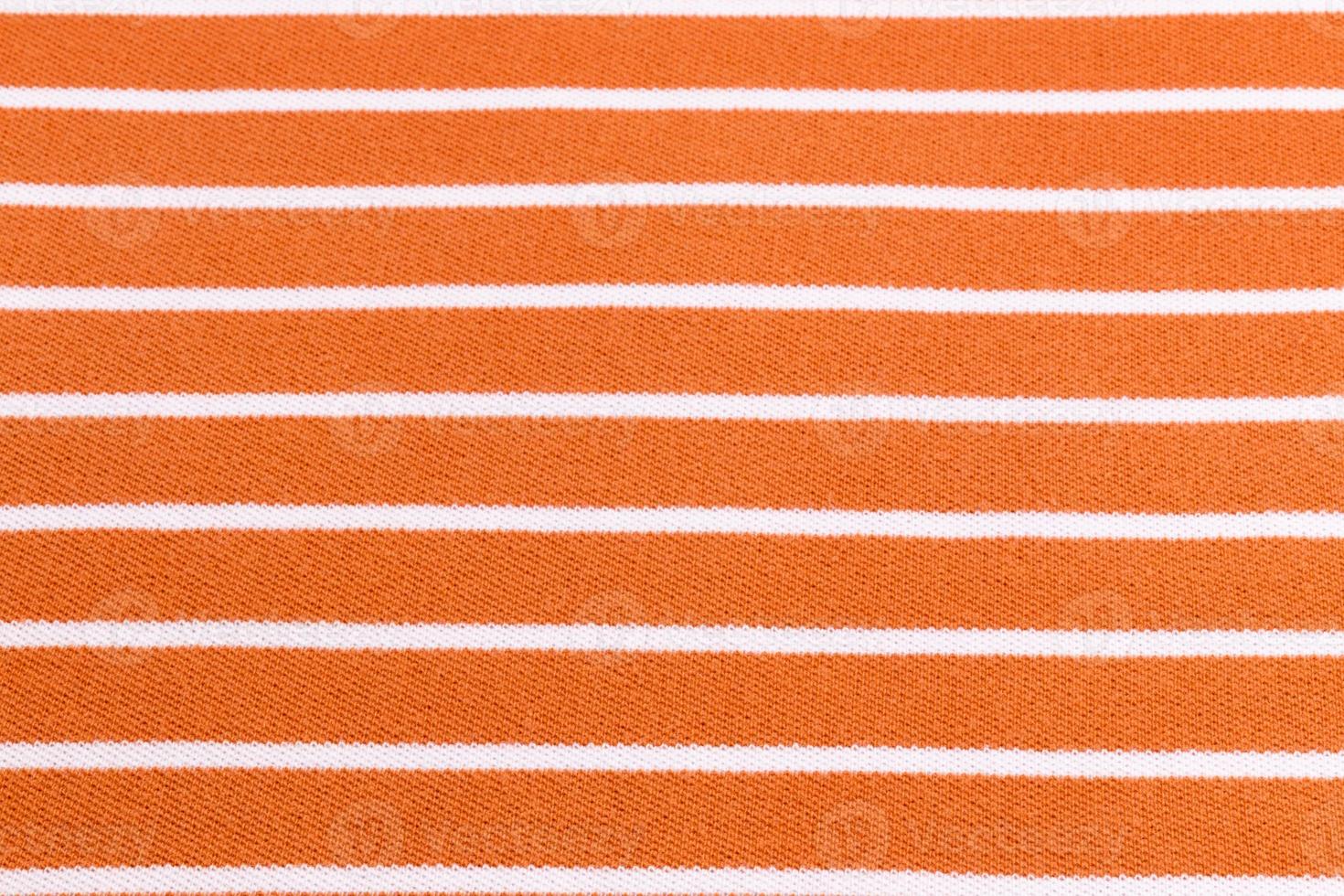 Hermoso fondo de verano hecho de tela naranja a rayas foto