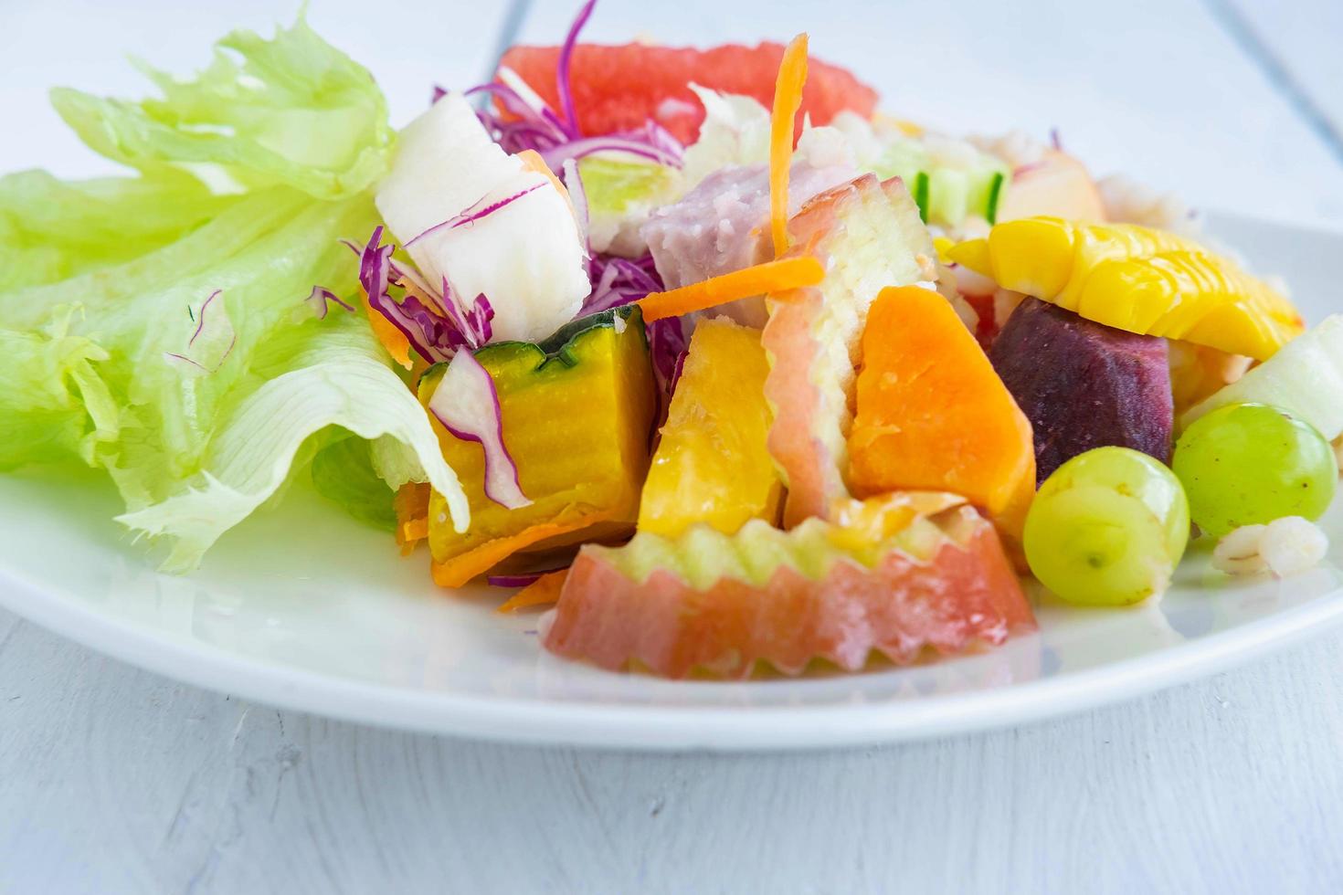 Healthy fruit and vegetable salad photo