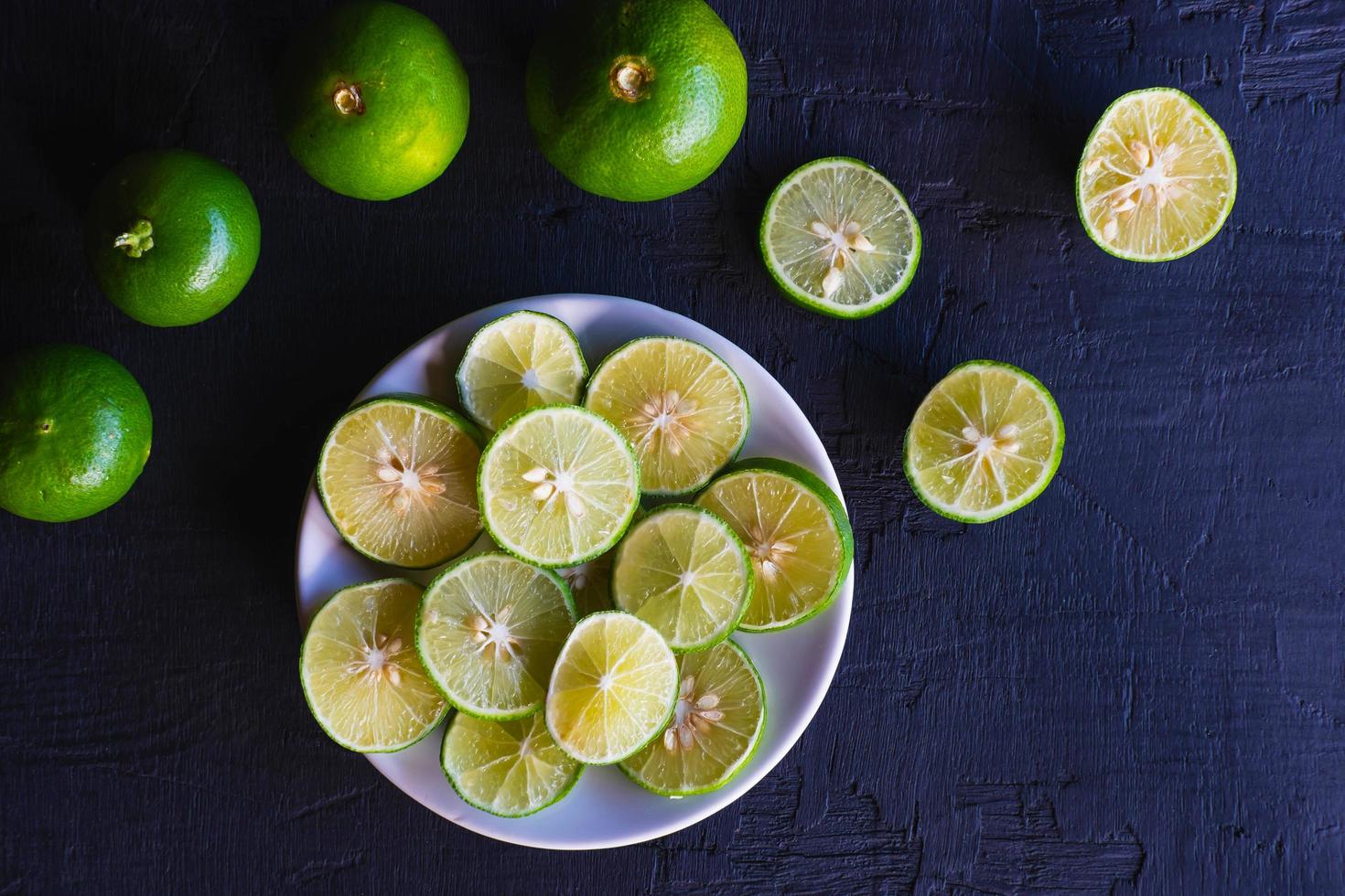 Fresh lemon slides on a plate photo