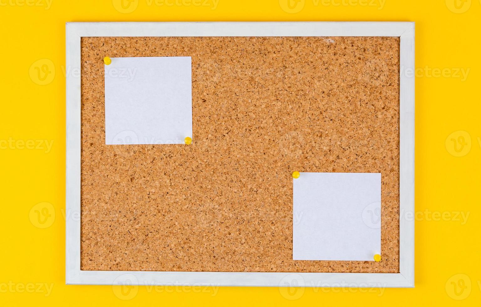 Abstract paper note pin on cork board photo