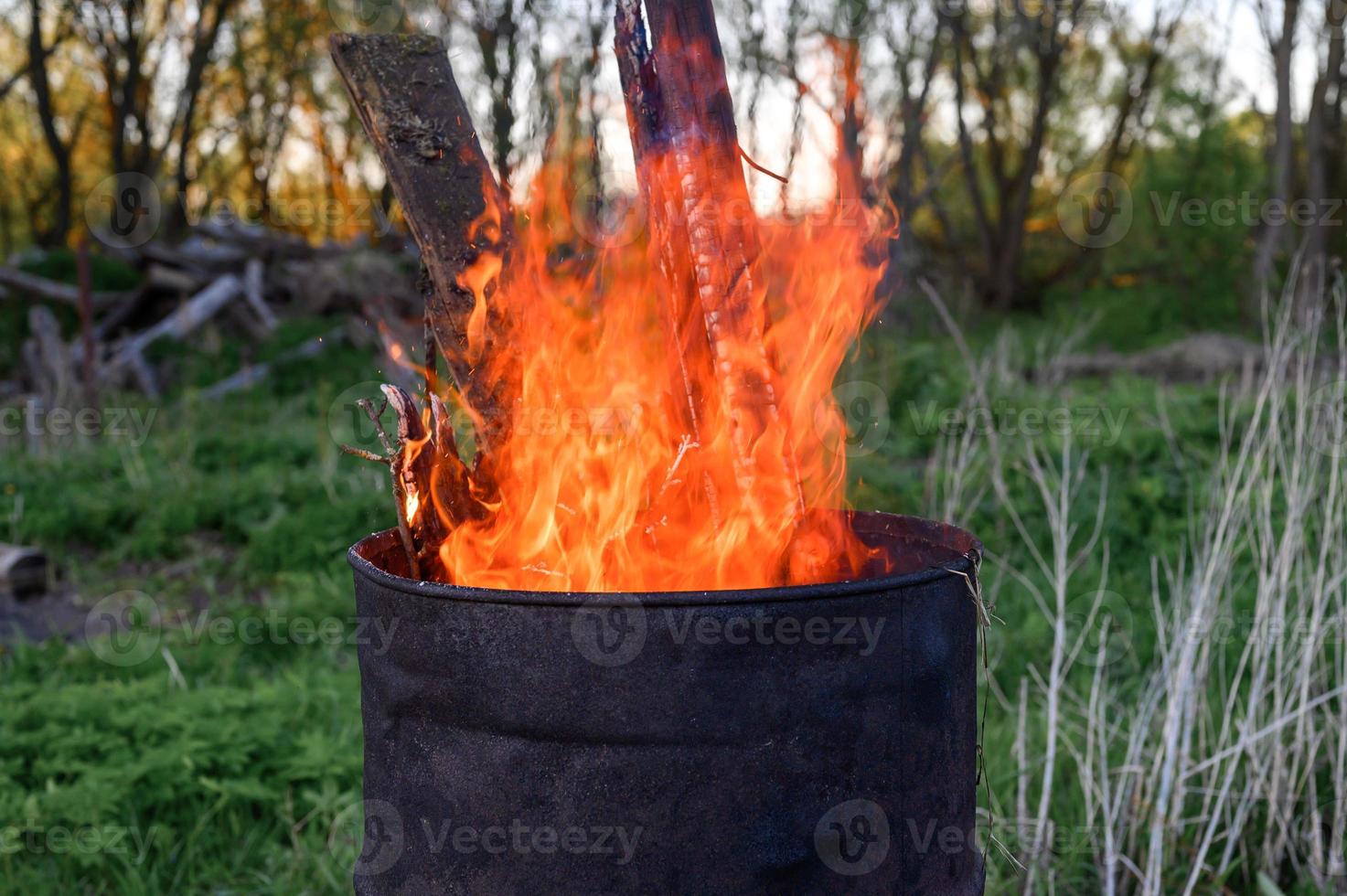 burning garbage barrel photo