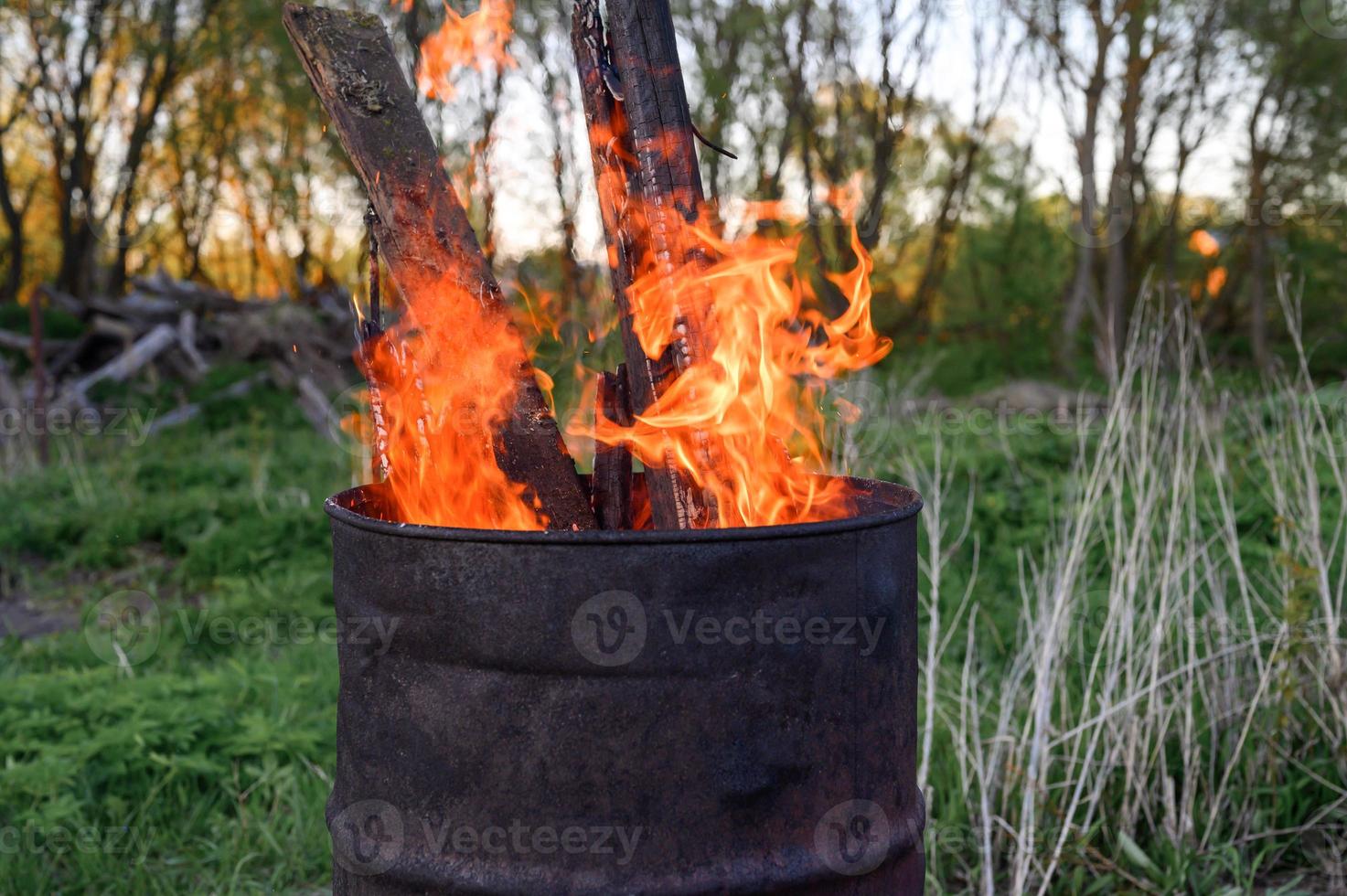 burning garbage barrel photo