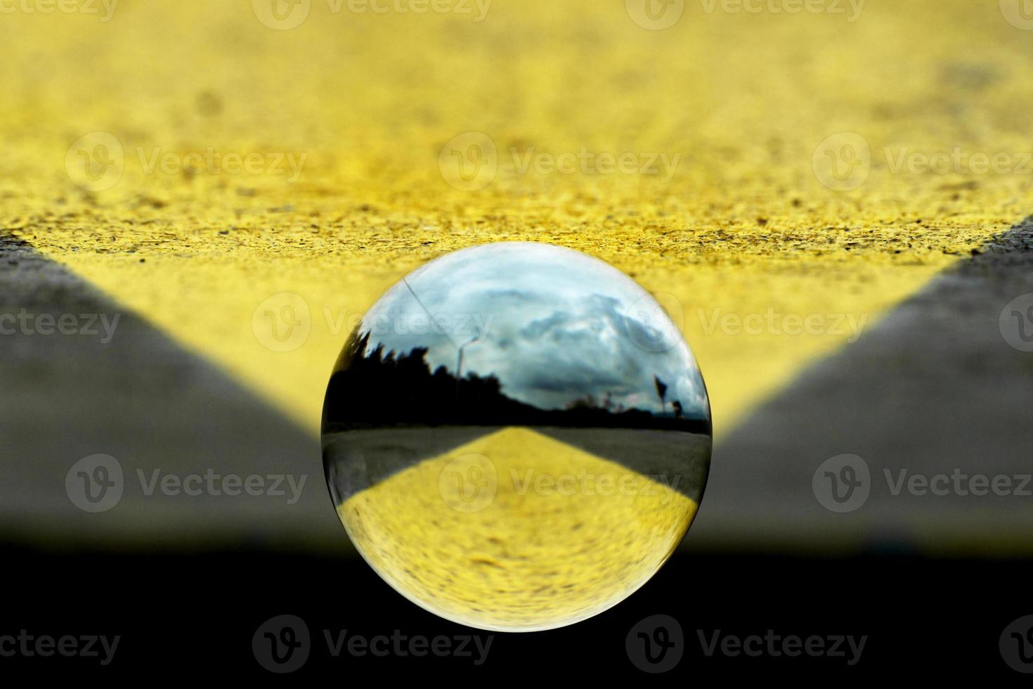 A lens ball on a geometric background photo