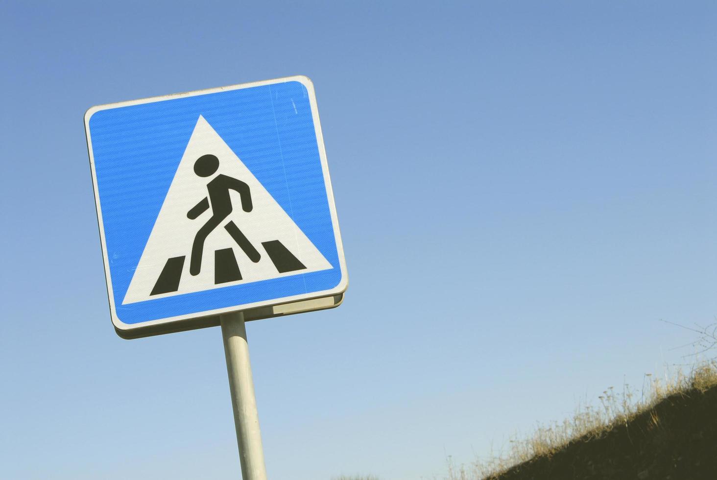 Zebra crossing sign in the street photo