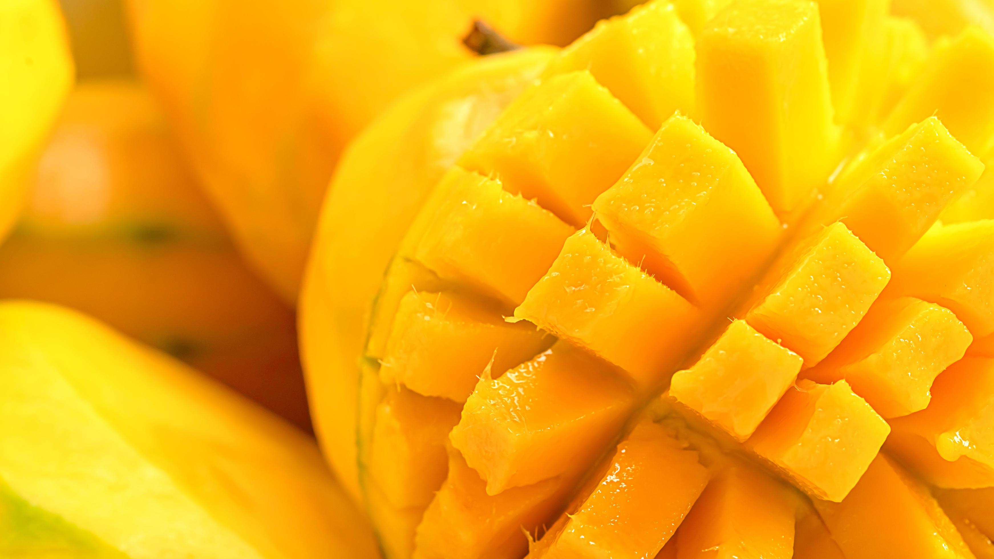 close up Mango fruit and mango cubes macro photography texture