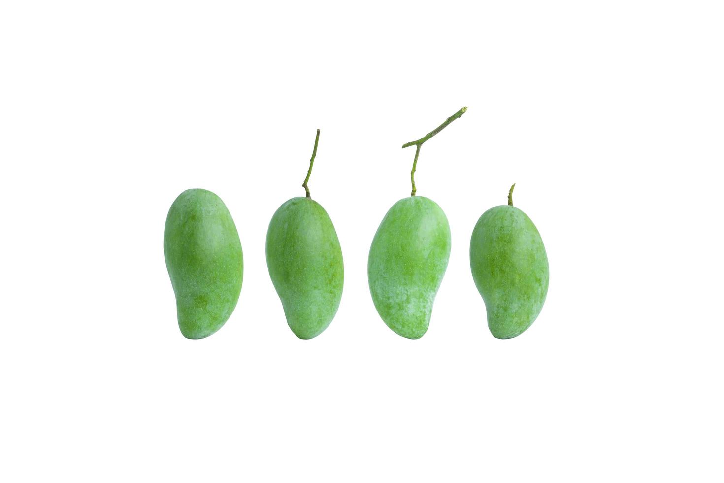 Group of raw mangoes  on white background photo