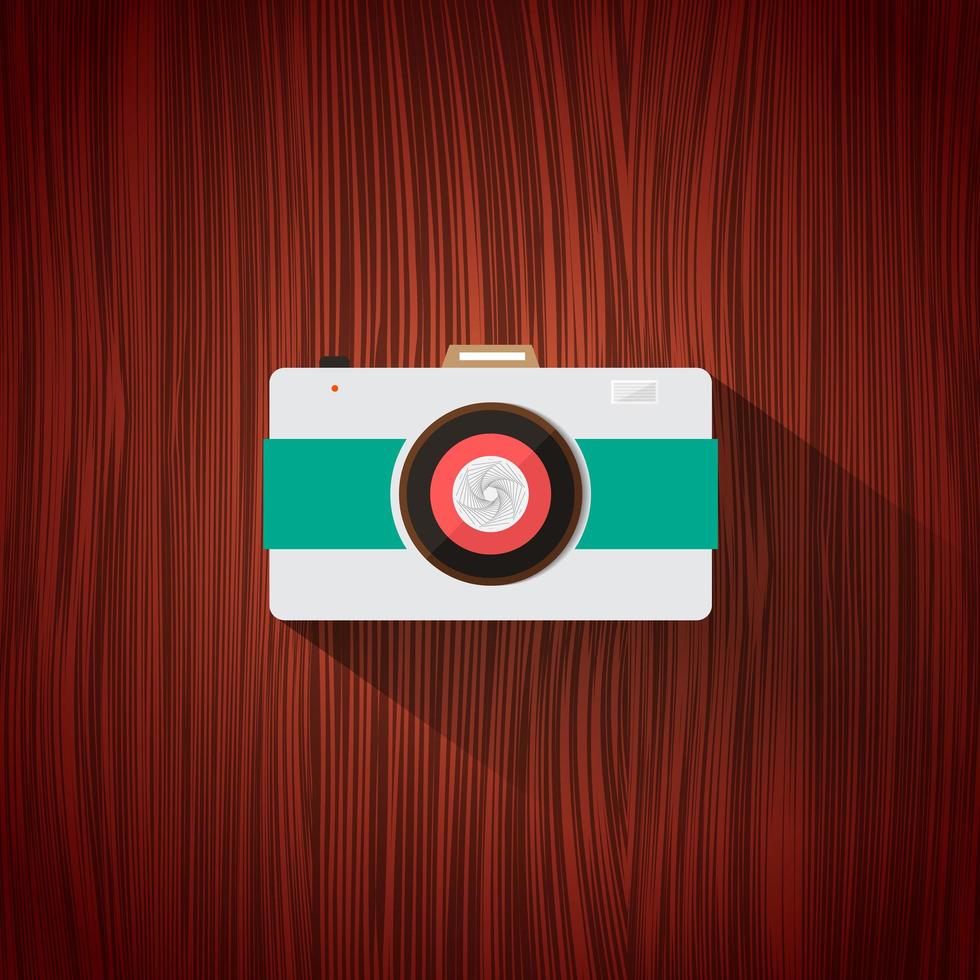 icono plano de cámara retro para diseño web y aplicación móvil sobre fondo de madera marrón. vector