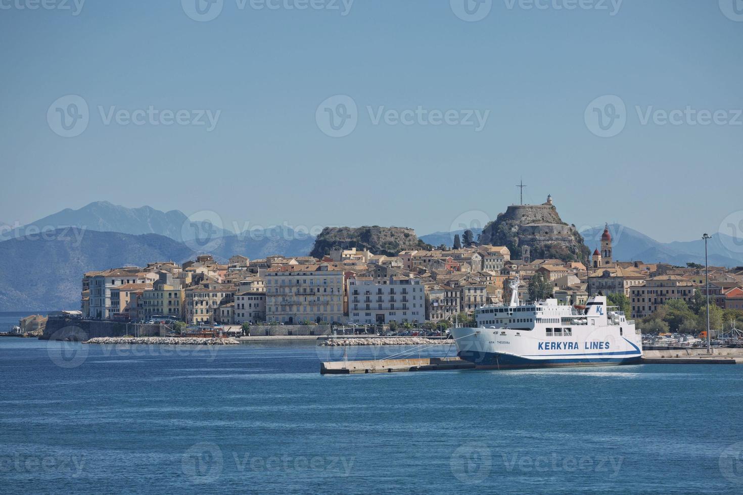 Kerkyra lines ferry and historical center of island of Corfu in Greece photo