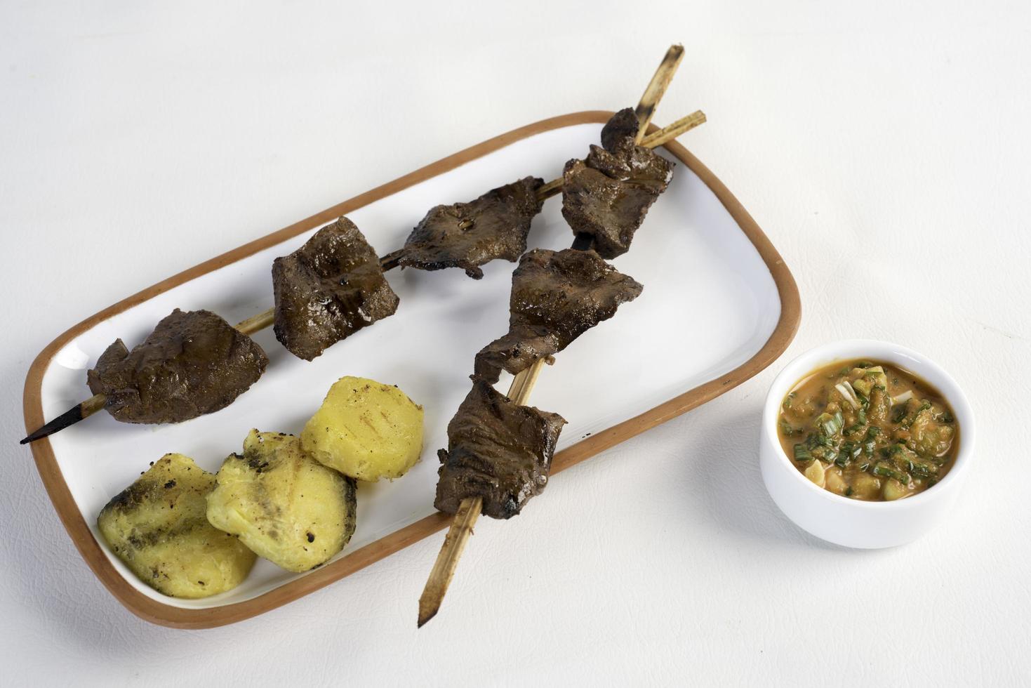 Anticuchos Peruvian cuisine grilled skewered beef heart photo