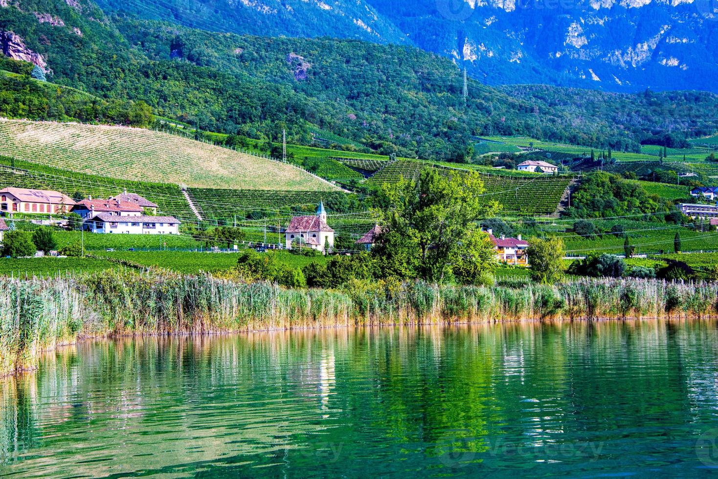 Morning at Lake Caldaro in Bolzano, Italy photo