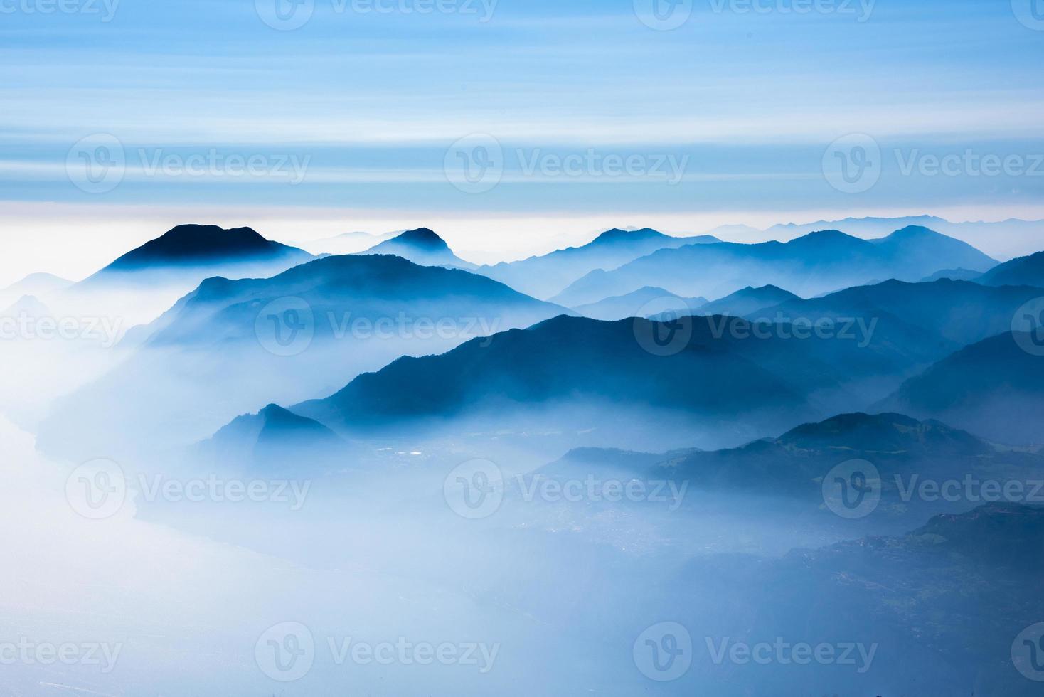 The peaks of the Alps around Lake Garda photo