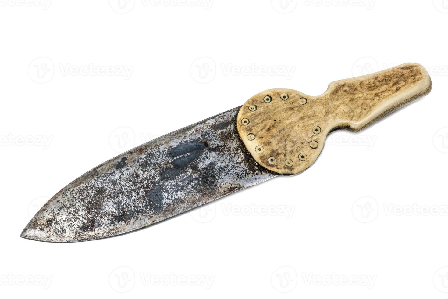 Indian hand forged knife with bone handle isolated on white photo