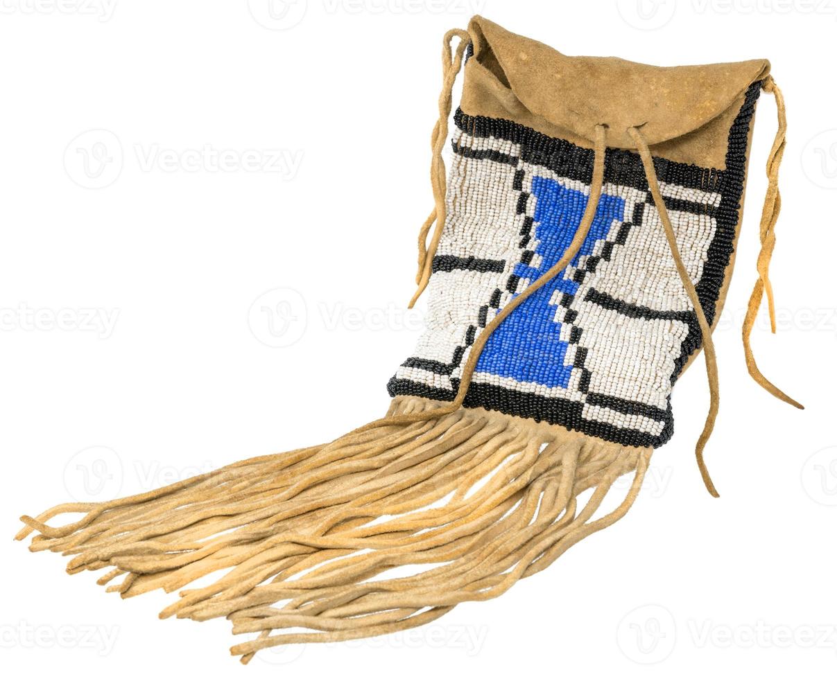 Bag of the North American Indians Made from deerskin embroidered with colorful glass beads and leather cords photo