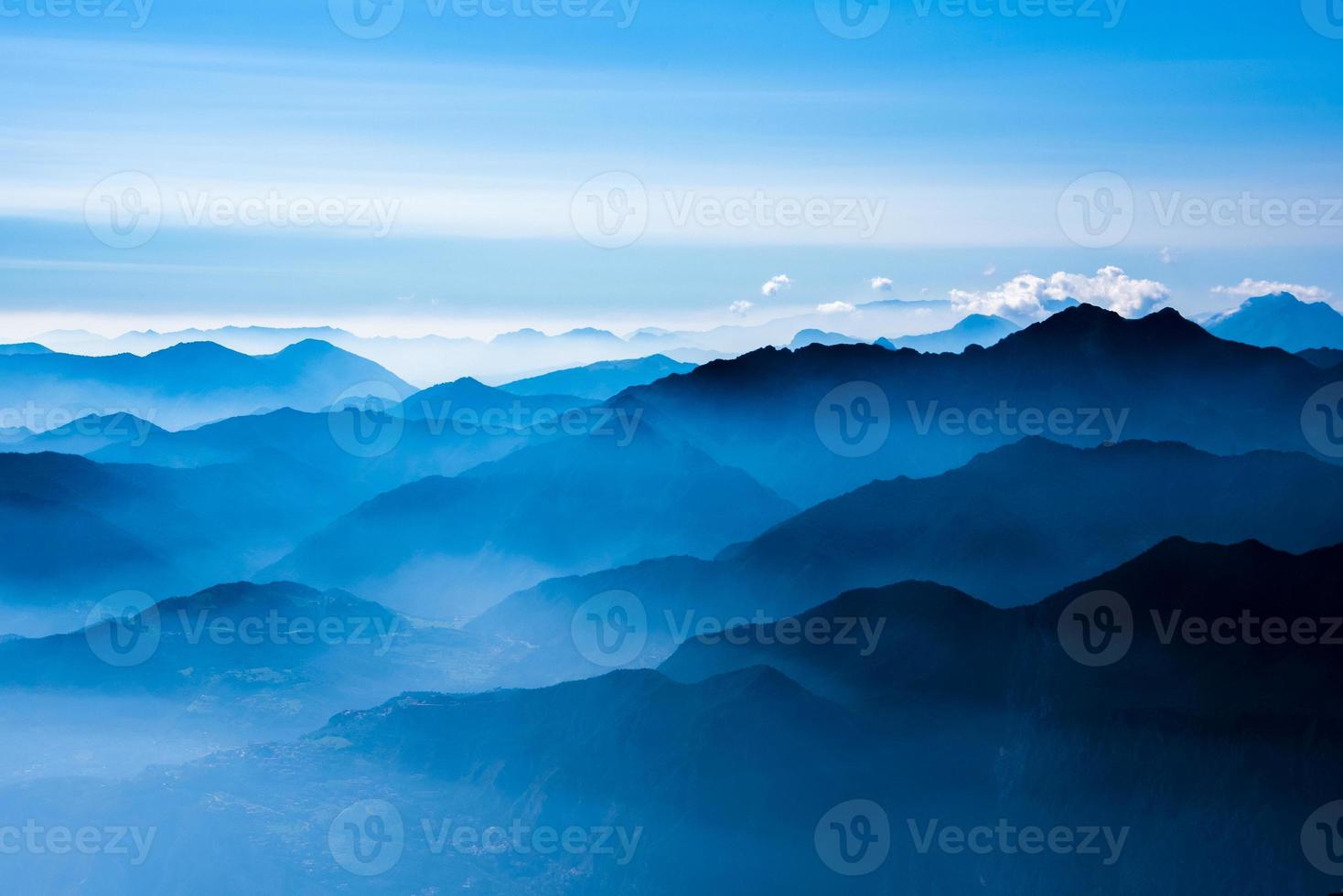 The peaks of the Alps around Lake Garda photo