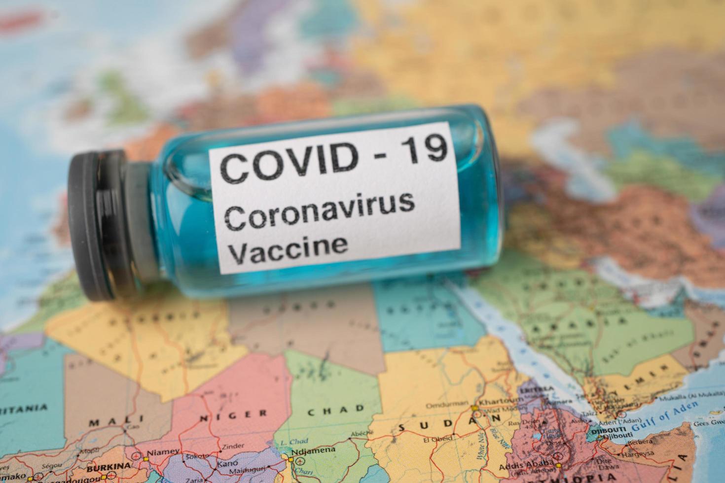 Coronavirus Covid 19 vaccine on Africa map development medical for doctor use to treat pneumonia illness patients photo