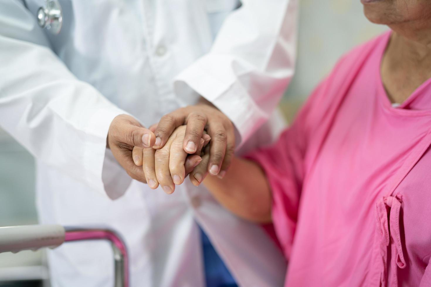 Holding hands Asian senior or elderly old lady woman patient with love photo