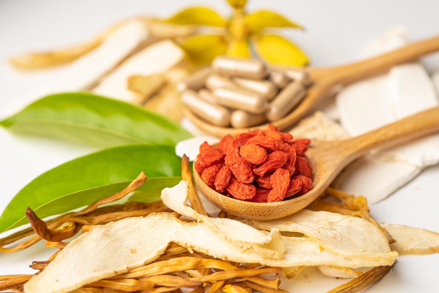 Chinese herb medicine with goji berries for good healthy photo