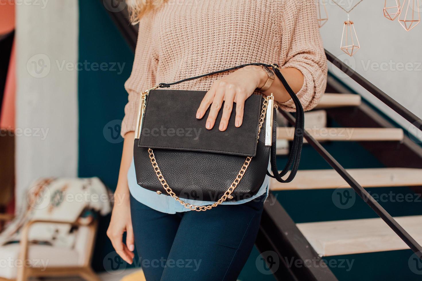 Beautiful bags compliment the style of a beautifully dressed girl photo