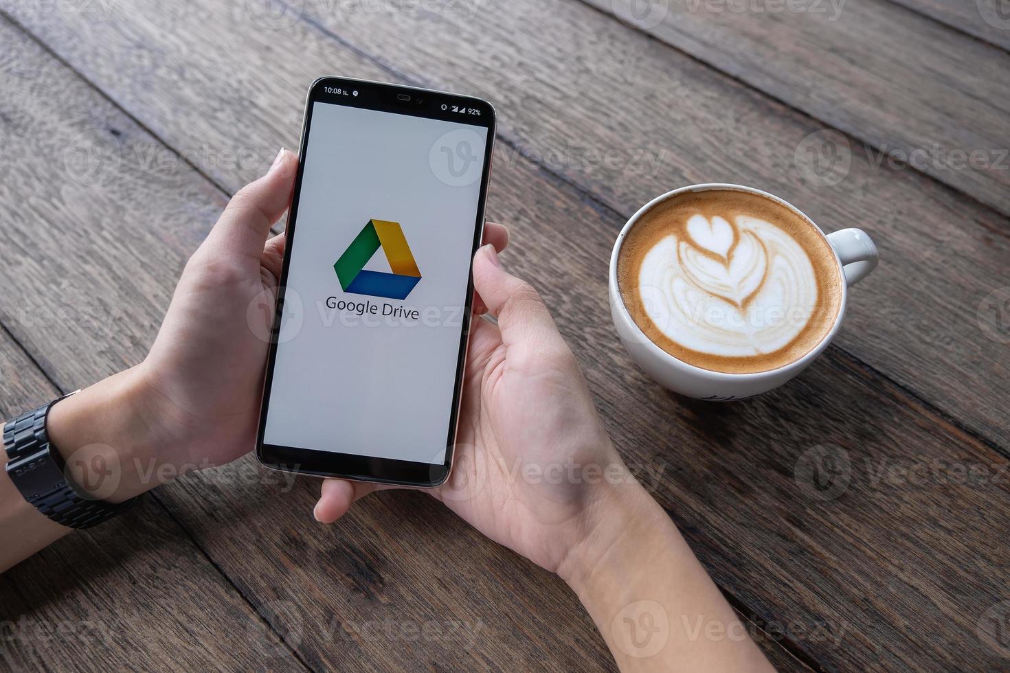 CHIANG MAI, THAILAND, May 11 2019, Man hand holding Oneplus 6 with login screen of Google Drive application photo