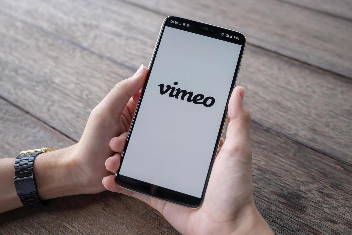 CHIANG MAI, THAILAND, May 11 2019, Man hand holding Oneplus 6 with login screen of Vimeo application photo