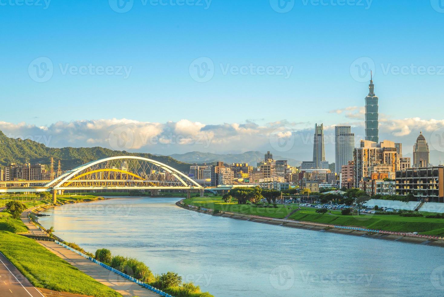 Skyline of the Taipei city by the river photo