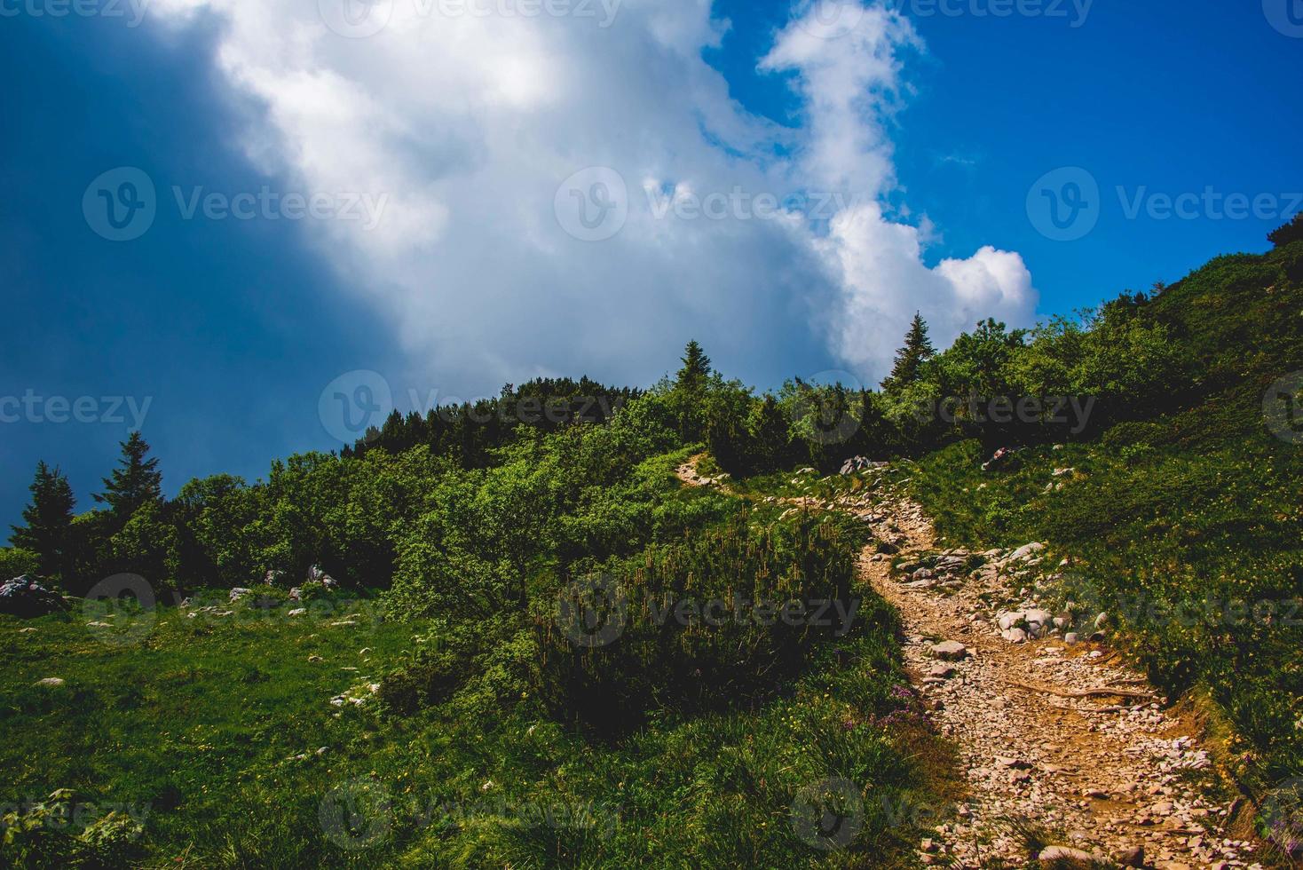 White clouds on the tops of the Venetian pre-Alps photo