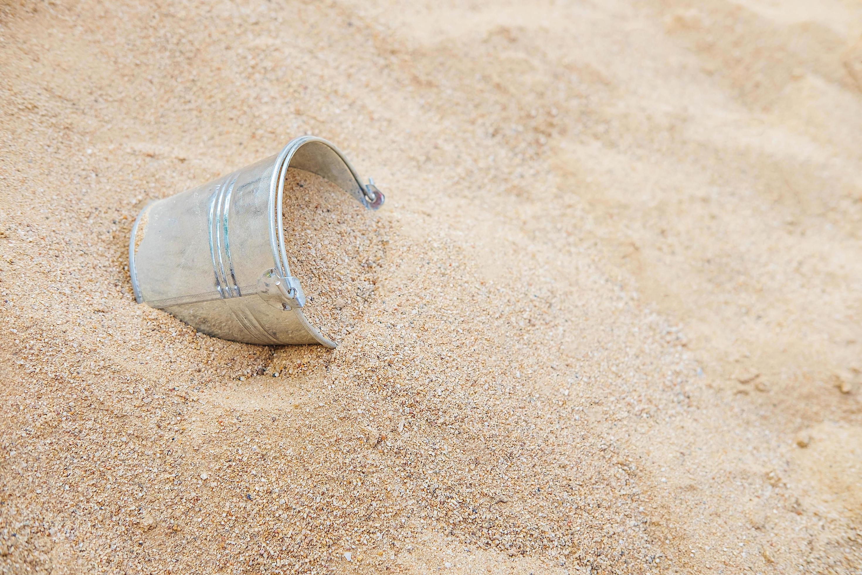 Bucket in the sand pile 2452680 Stock Photo at Vecteezy