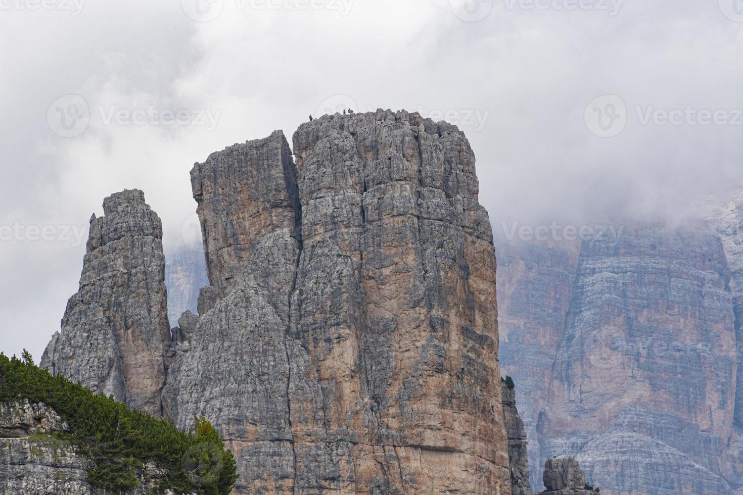 Mountaineers climb the pinnacles of the Dolomites photo