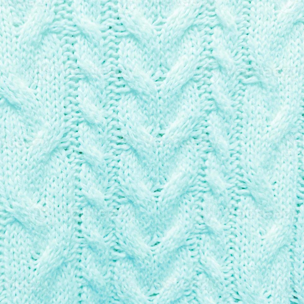 Turquoise blue knitted textured pattern Square background photo