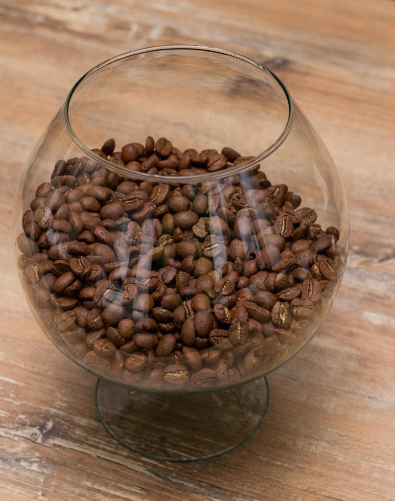 granos de cafe en tarro de cristal foto