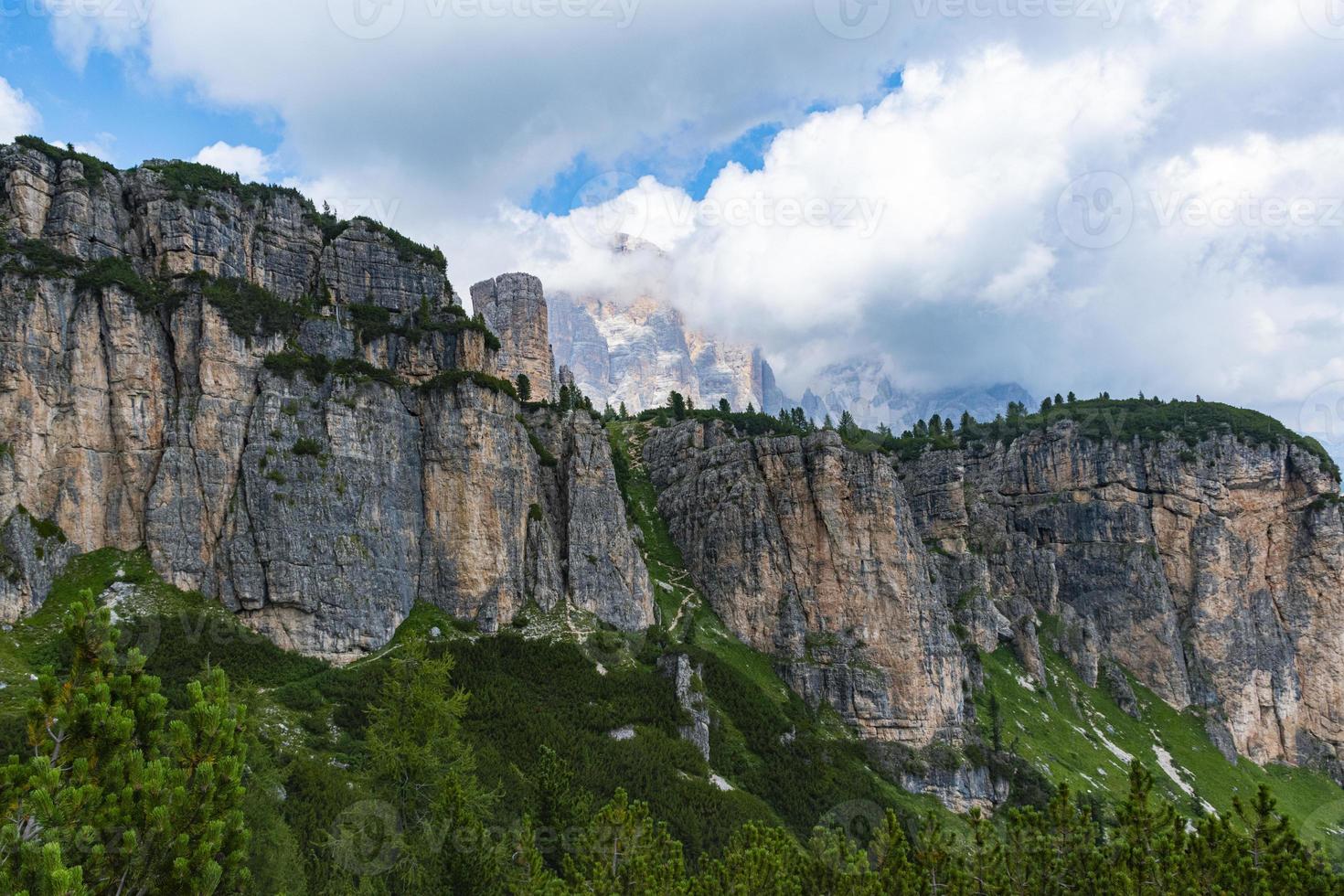 Clouds over the peaks of the Dolomites photo