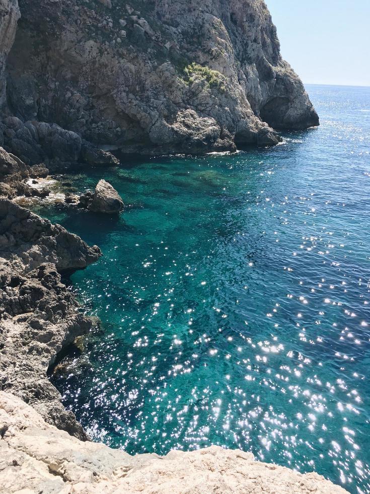 Ocean landscape over rocky cliff photo