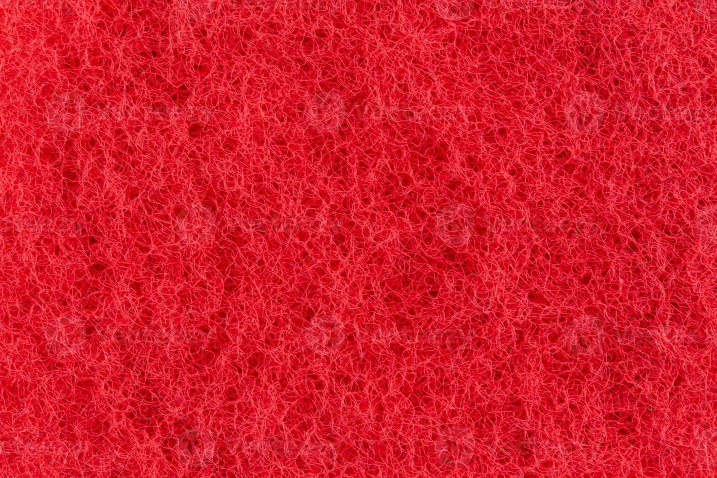 textura abstracta de la superficie roja de una toallita foto