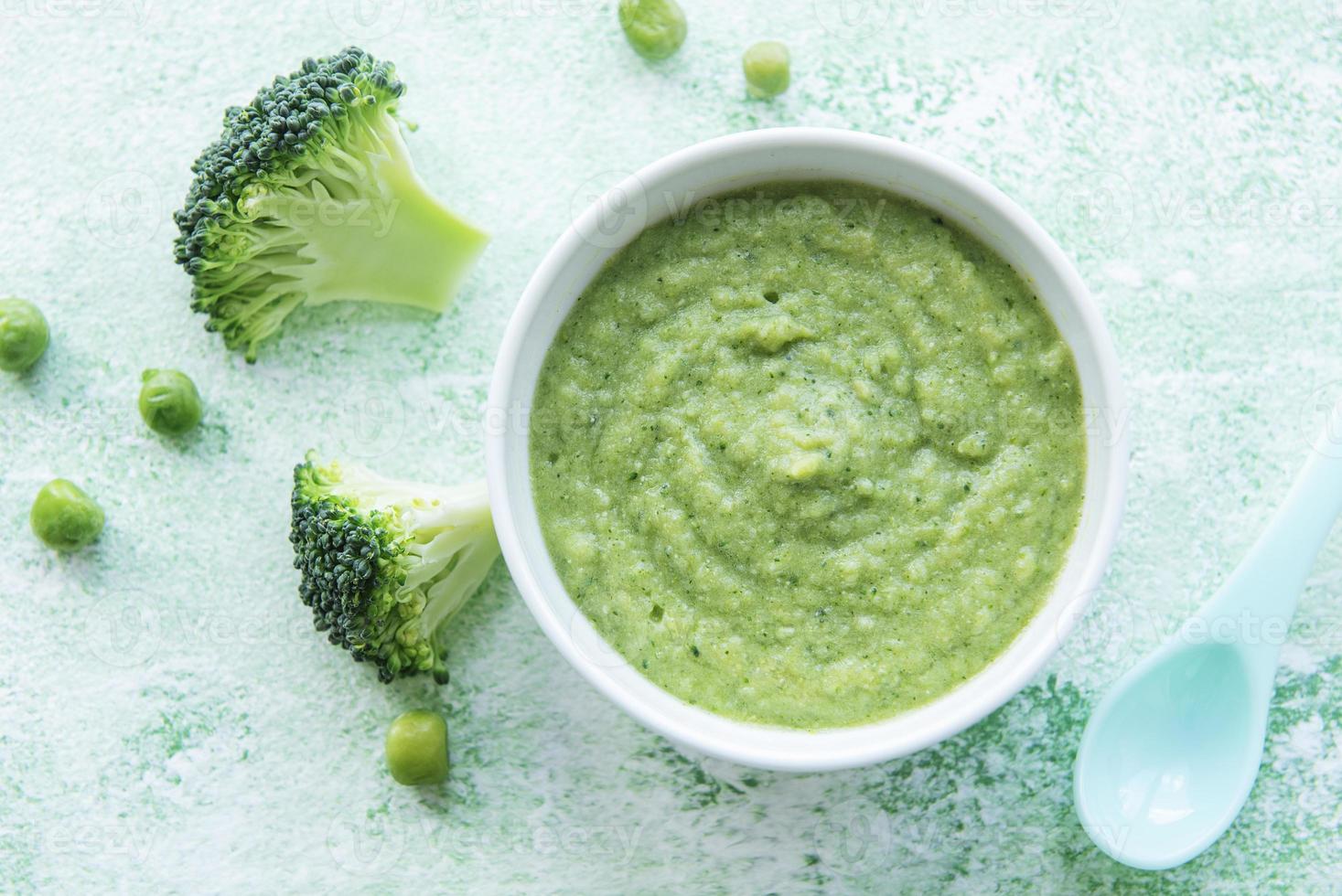 Baby food Organic green broccoli  puree with ingredients photo
