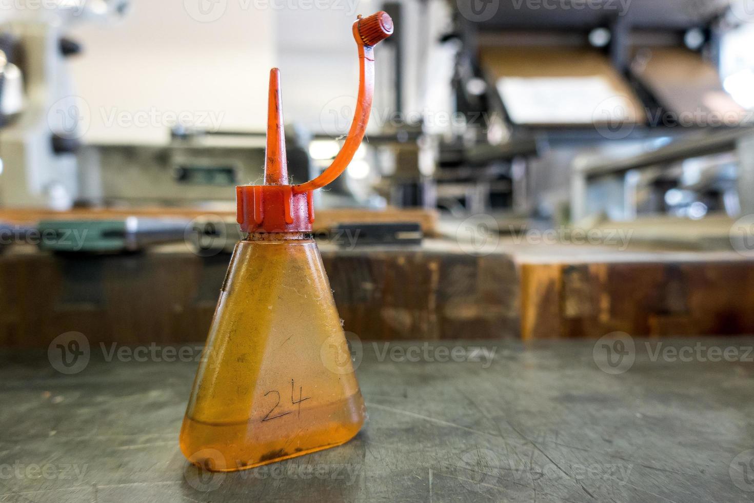 oil jug in a traditional print shop photo