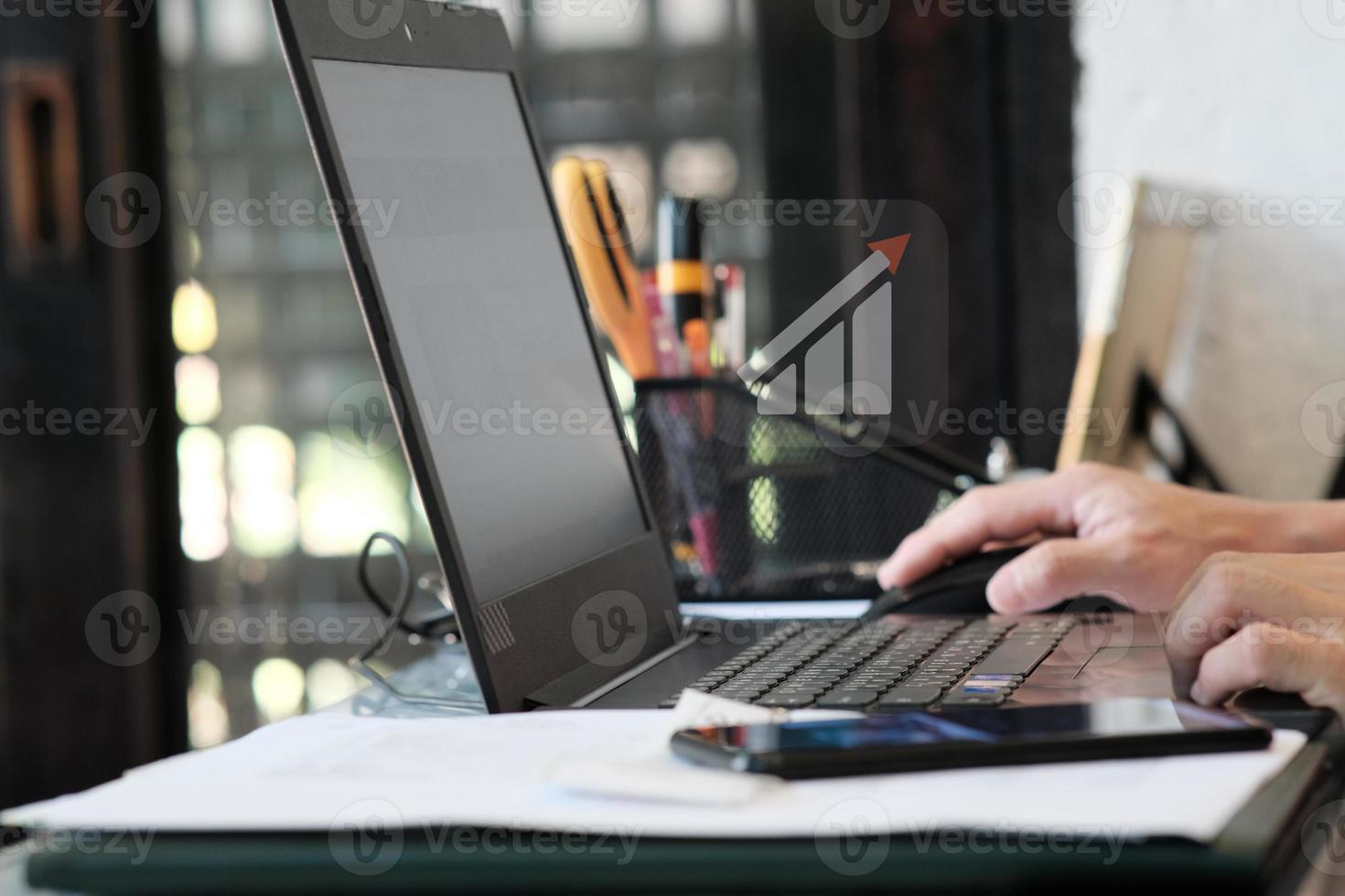 Man using on laptop computer and business analytics intelligence concept photo