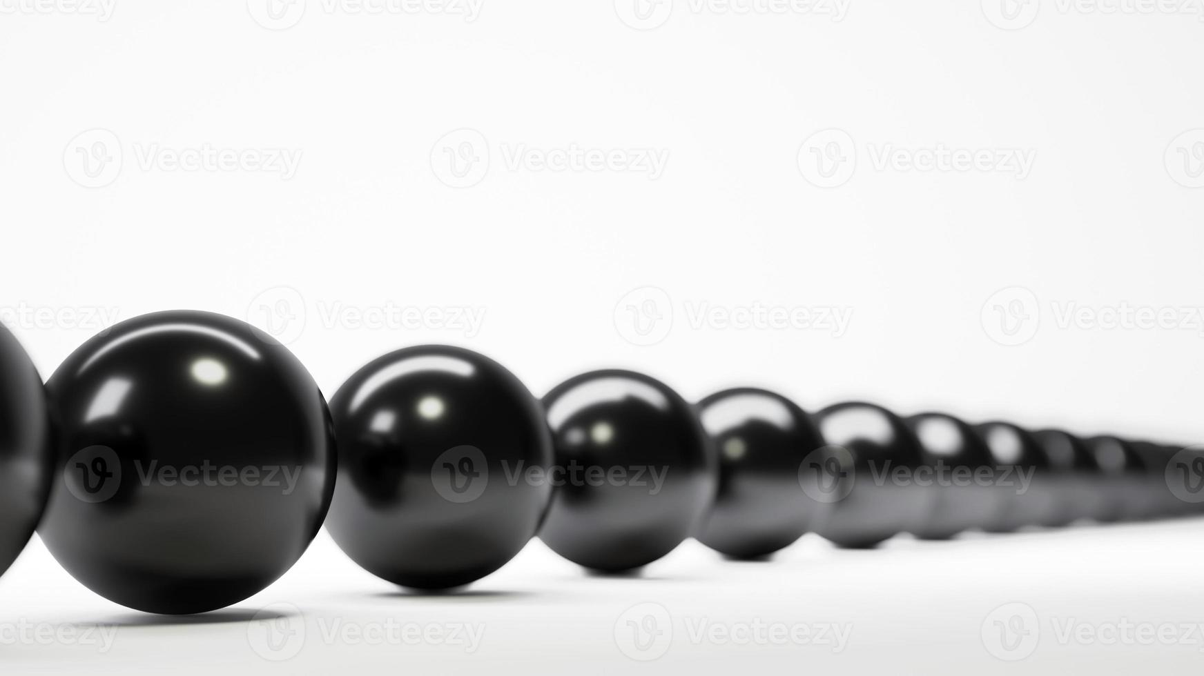 hilera de bolas negras profundidad de campo foto
