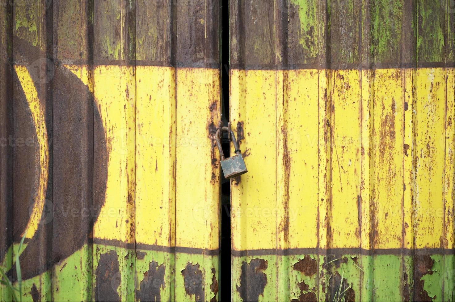 Old rusty electricity distribution box in bright vivid colors photo