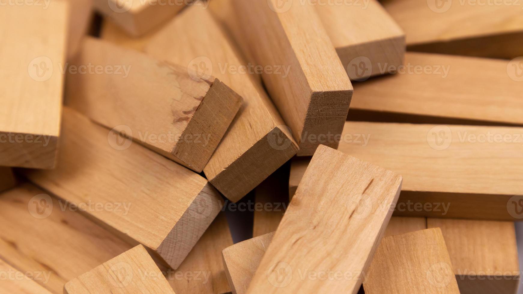 The texture of a pile of wooden blocks that lie randomly photo