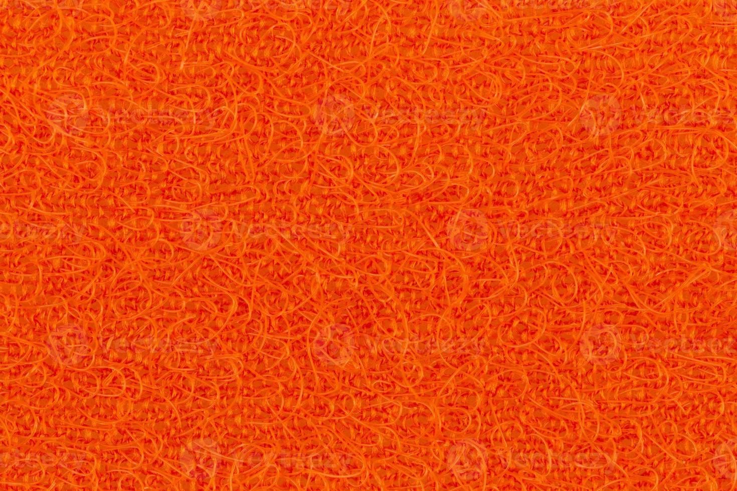 textura abstracta de la superficie naranja de una toallita foto