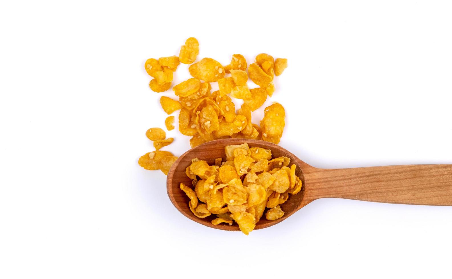 Crunchy corn flakes cereal isolated on white background photo