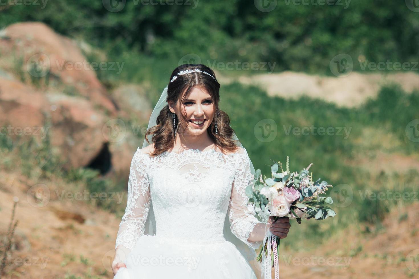 Rustic style emotions of the bride in nature photo