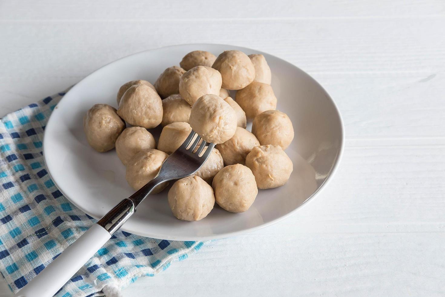 Meatballs on a plate on the table photo