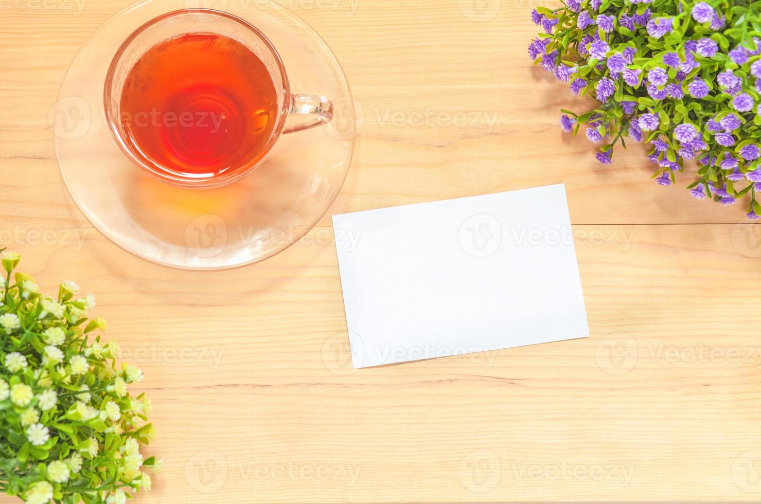 Paper note on wood background photo