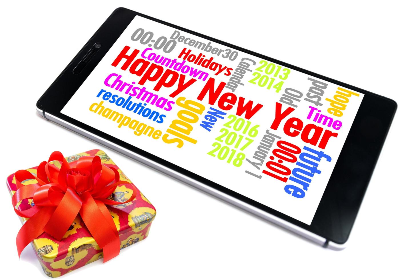 Smart phone with a gift box on white background photo