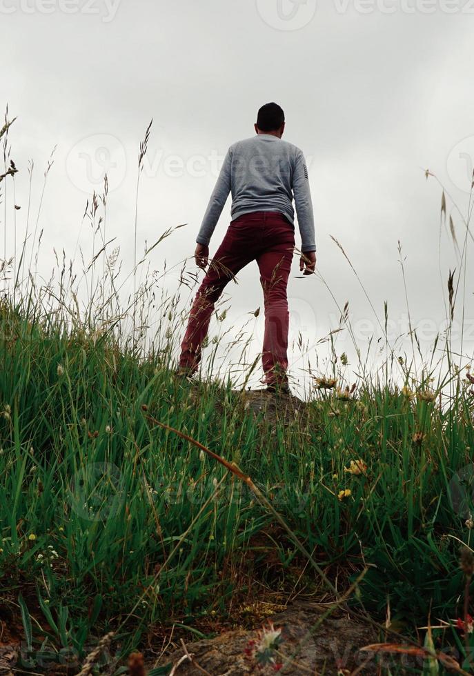 man trekking in the mountain in Bilbao Spain photo