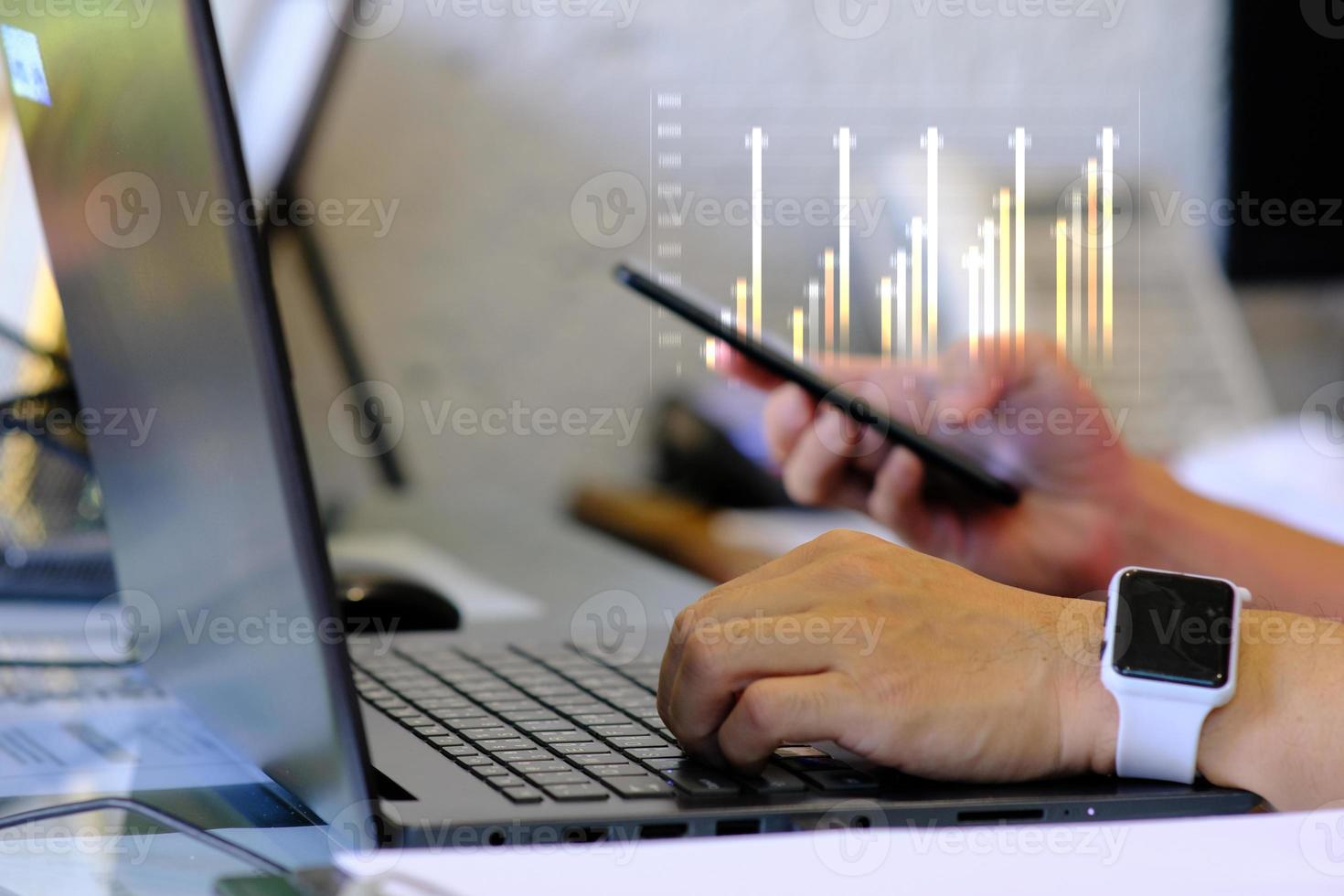 Person working on laptop computer and business analytics intelligence concept photo