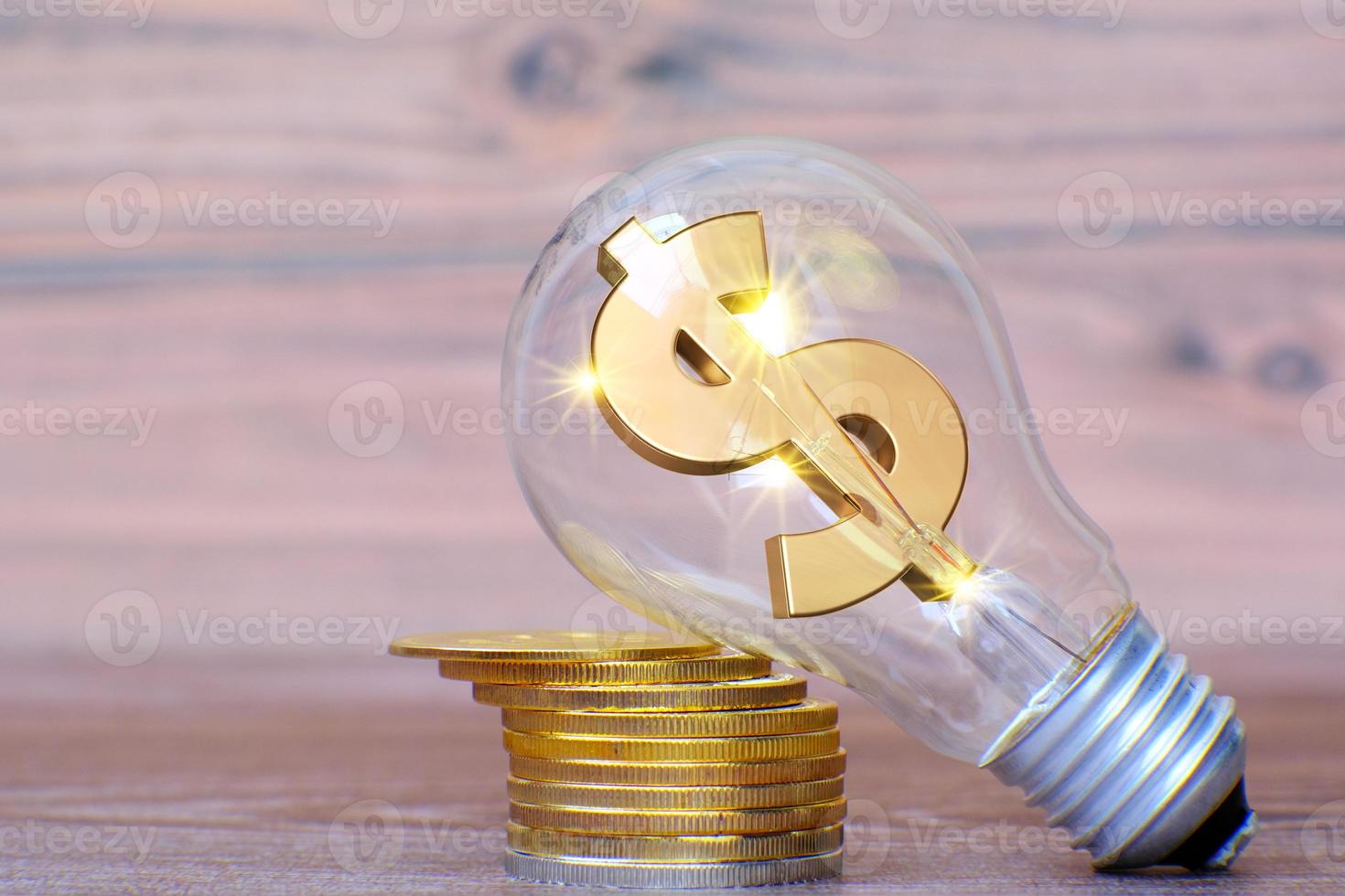 Energy saving light bulb with money and  business growth concept and new ideas innovation photo